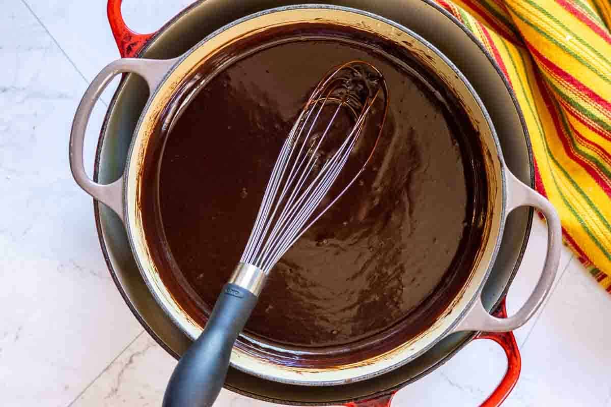 Cooking Mexican Chocolate Sauce in a double boiler pan.