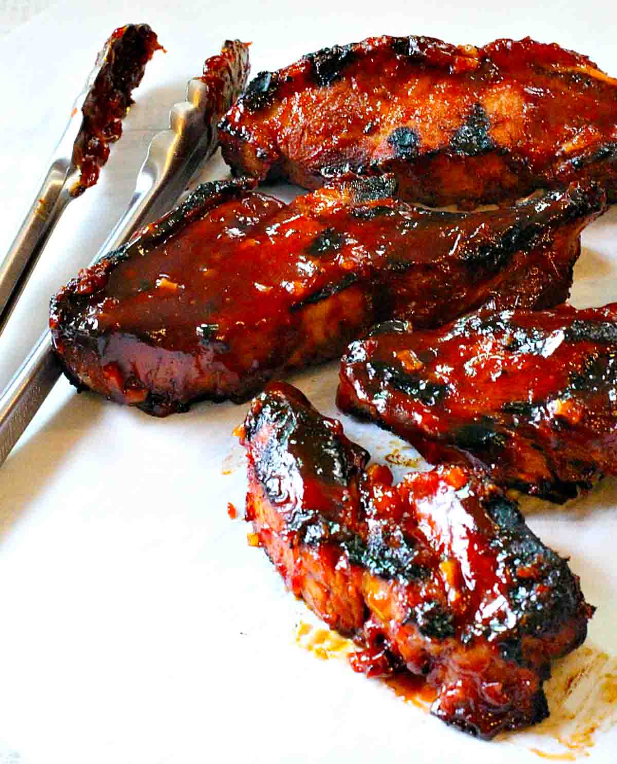 Grilled Country Style Pork Ribs slathered in bbq sauce.