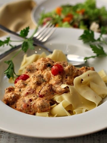 Ricotta Pasta Sauce with Italian Sausage, cherry tomatoes over pappardelle pasta