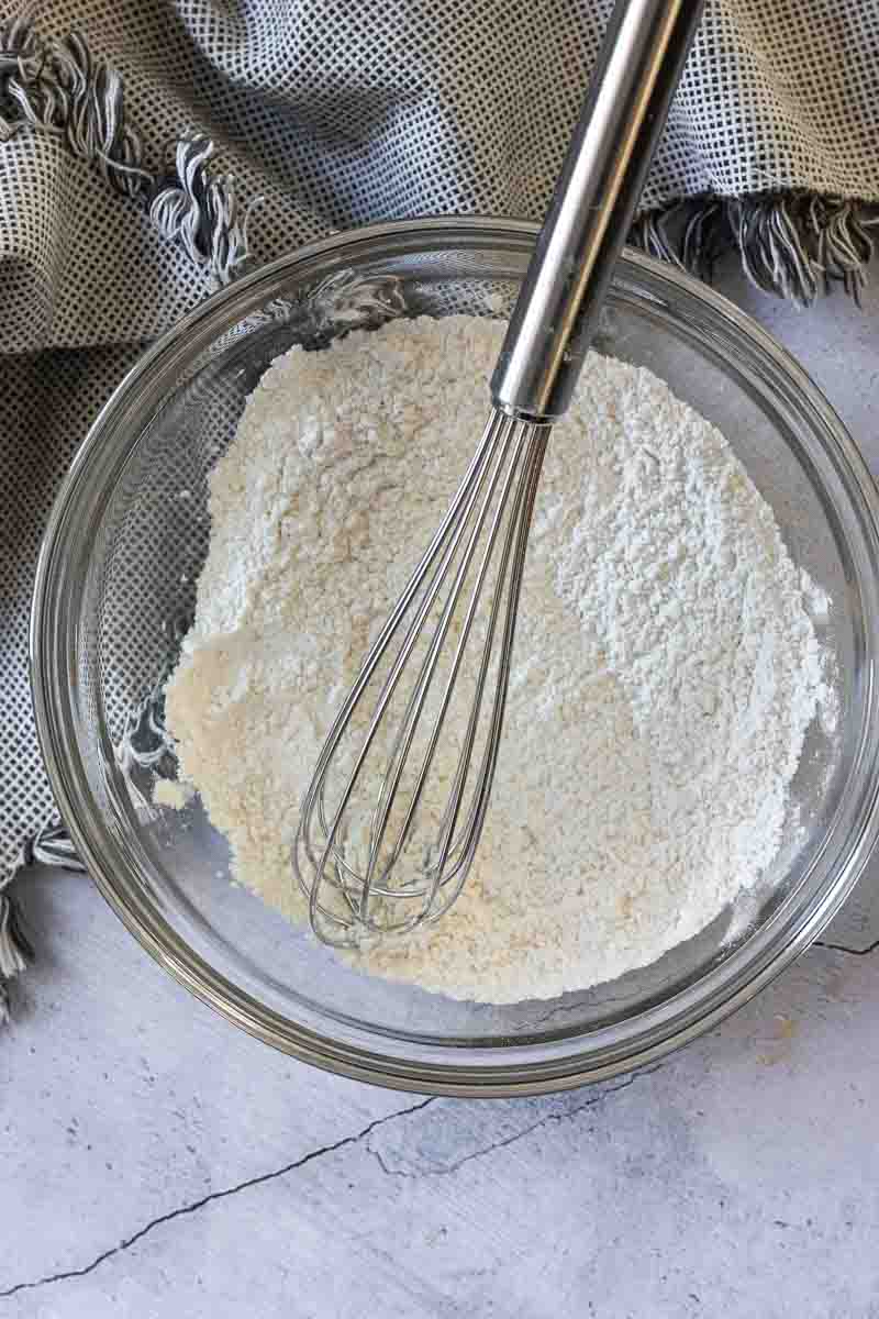 Mixing dry ingredients for Italian Egg Casserole.