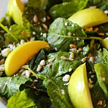 Baby Kale Salad with apples and sunflower seeds.