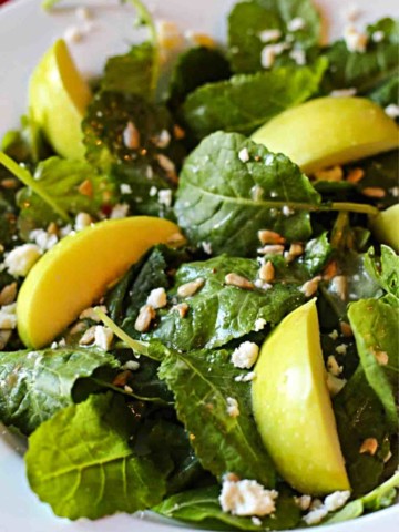 Baby Kale Salad with apples and sunflower seeds.