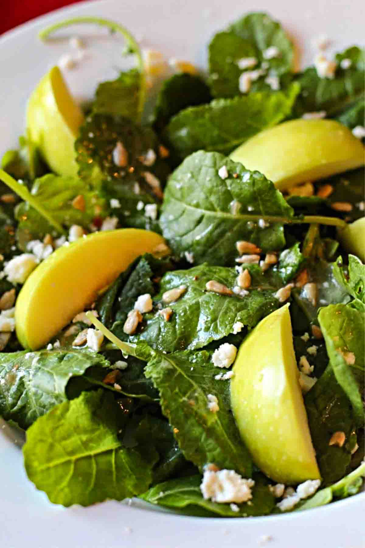 Baby Kale Salad with apples and sunflower seeds.