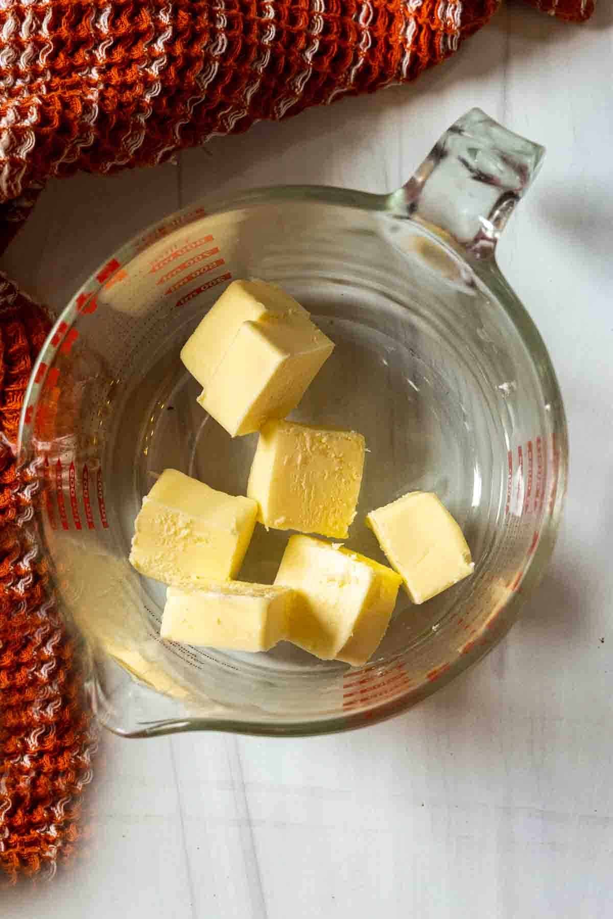 Step 1: melting butter for basting a boneless turkey breast roast.
