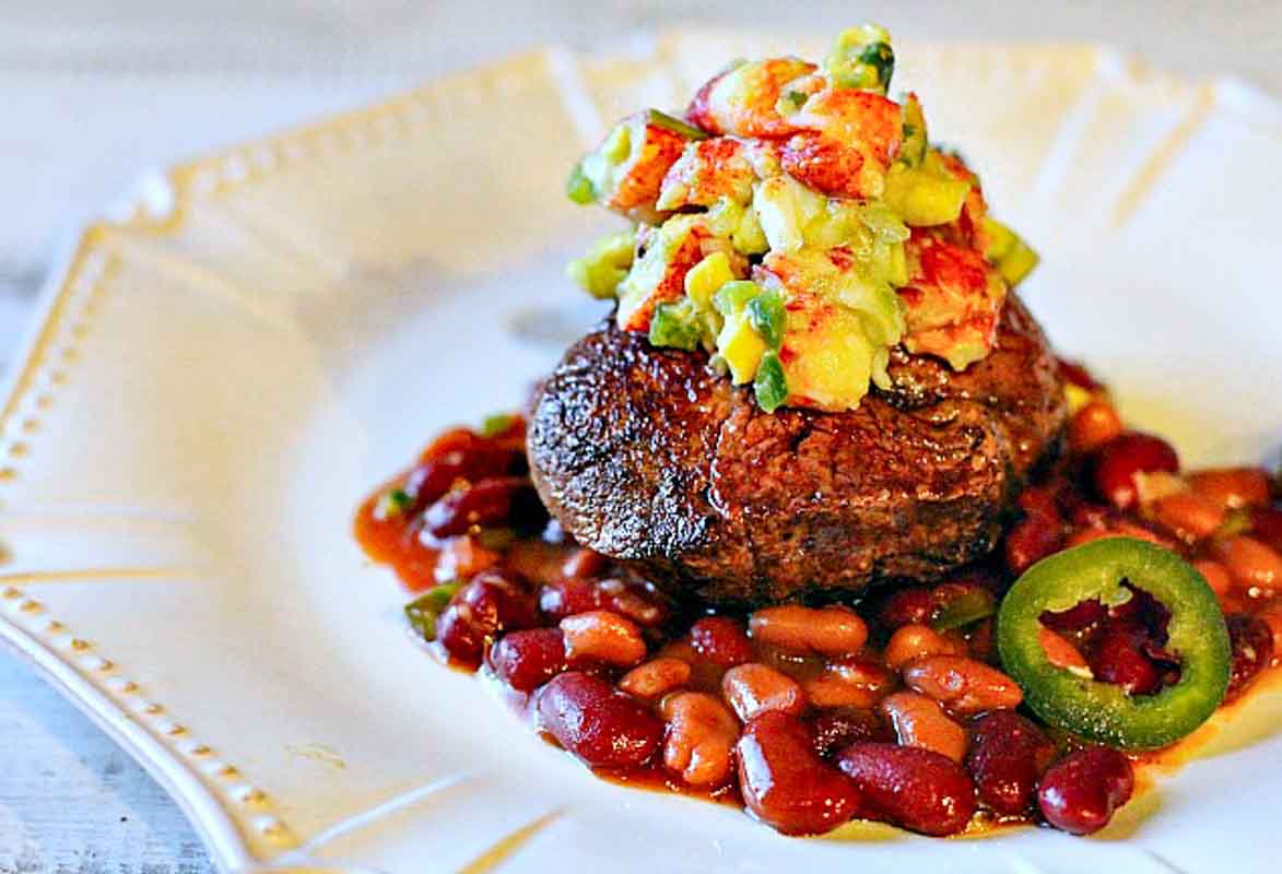 Pan seared filet topped with lobster avocado salsa.