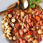 Mayocoba bean soup with potatoes and vegetables.