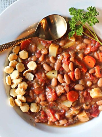 Mayocoba bean soup with potatoes and vegetables.