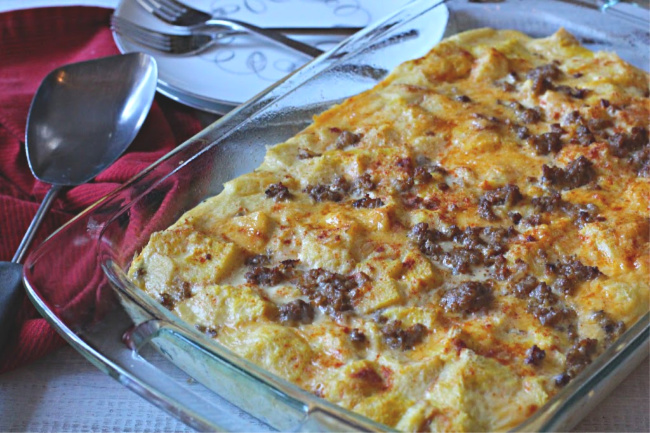 Sausage egg cheese casserole in a 9 x 13 pyrex casserole dish