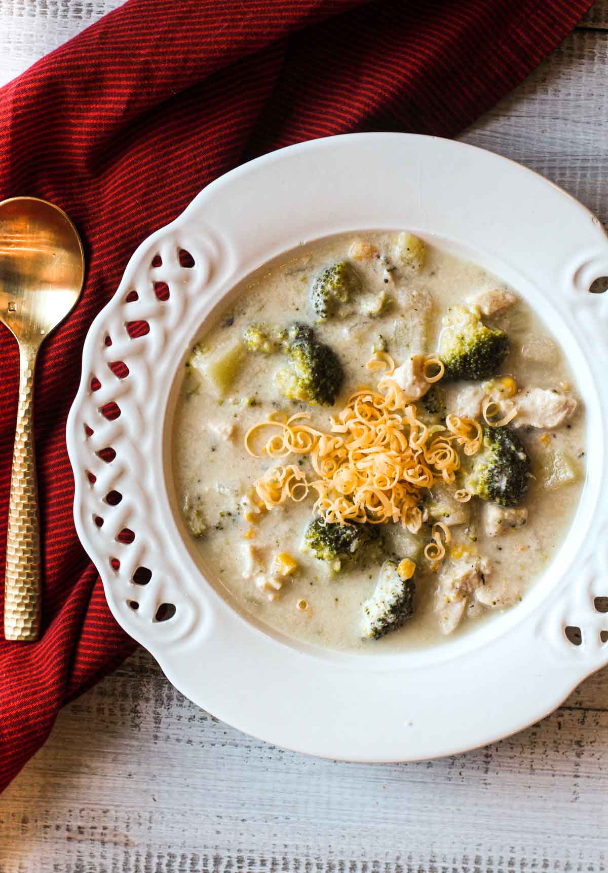 Chicken Vegetable Chowder in a white lattice bowl.