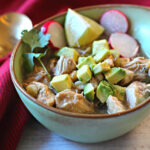 Pork Posole Recipe in the Instant Pot Pressure Cooker served in a green Frankoma soup bowl.
