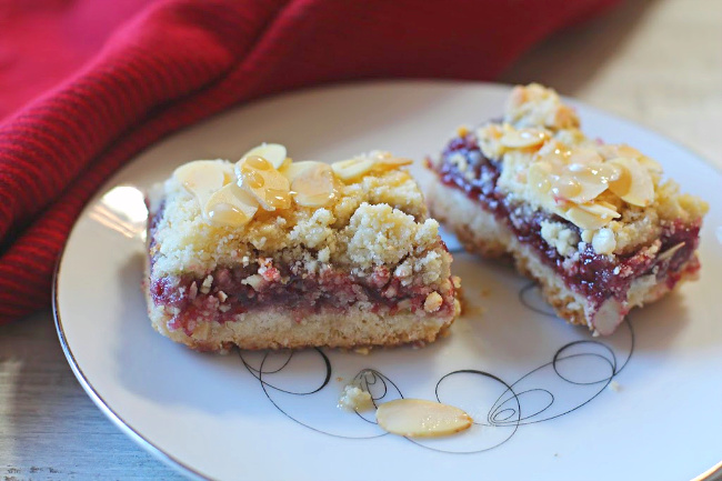 Raspberry Bars on a tempo antique saucer