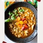 A bowl of chickpea soup image for pinterest.