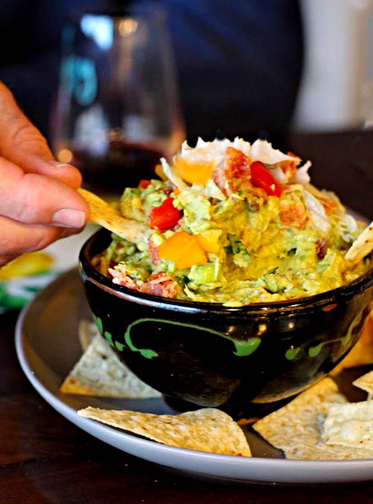 Bacon lettuce tomato guacamole served with tortilla chips.