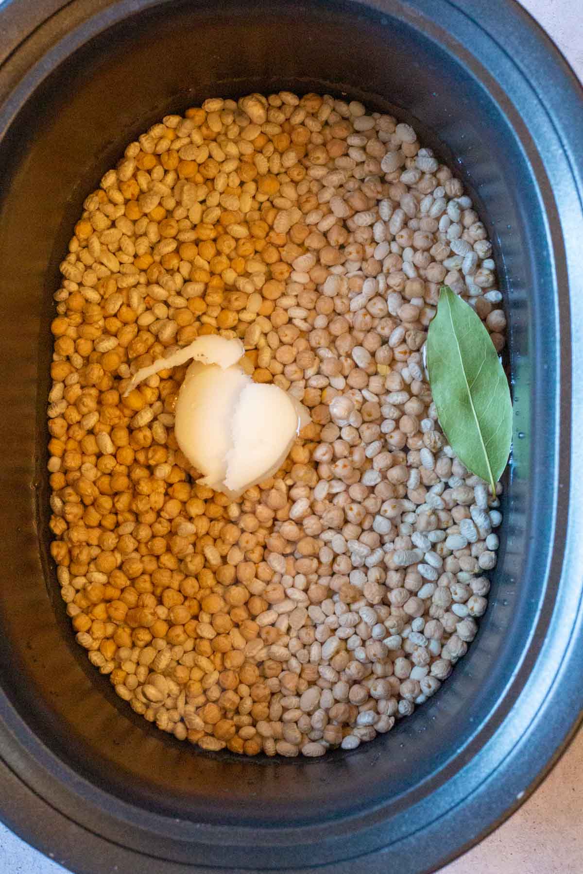 Cooking dried chickpeas and navy beans in a crockpot.