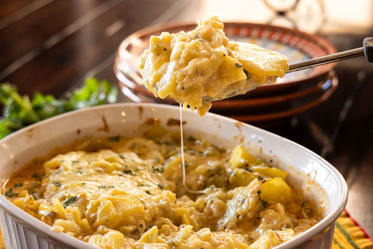 Instant Pot Green Chile Scalloped Potatoes in a casserole dish.
