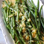 Green beans in a French Mustard Sauce on a Sur la Table White scalloped platter