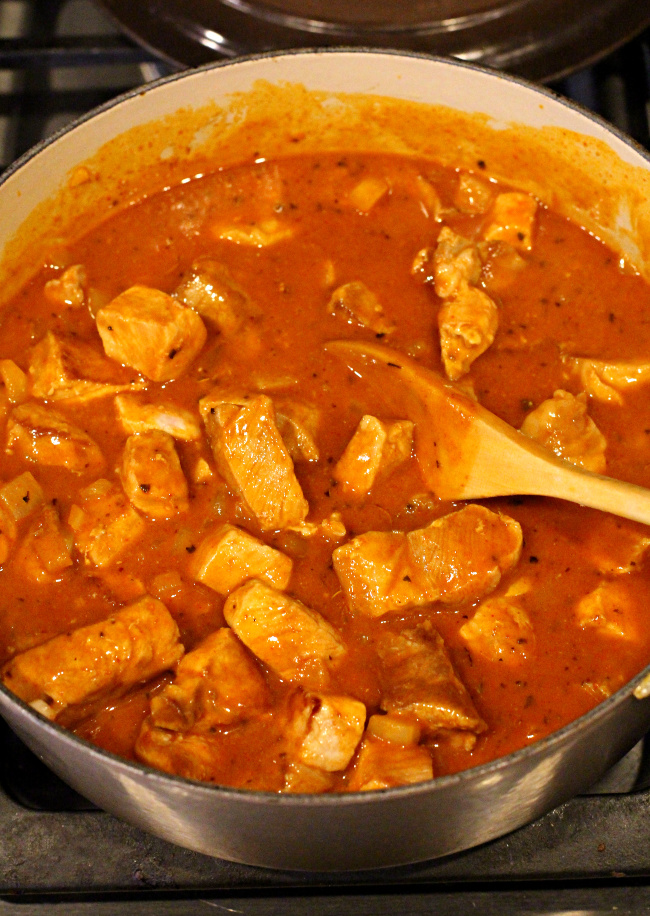 Pork loin roast marinating in New Mexico Red Chile Sauce