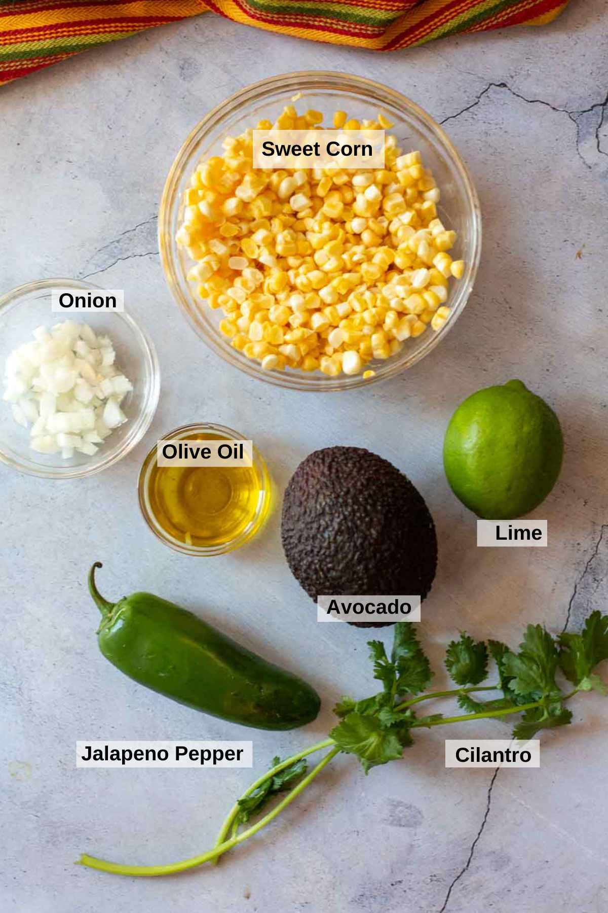 Ingredients to make roasted corn guacamole.