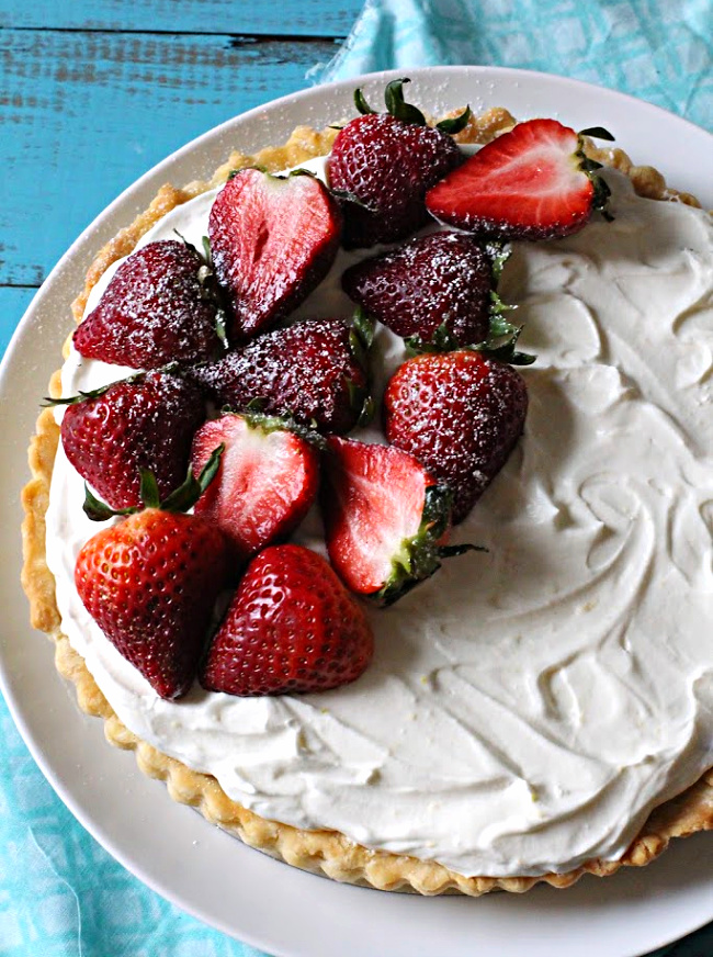 Strawberry Cream Tart with whole halved fresh strawberries