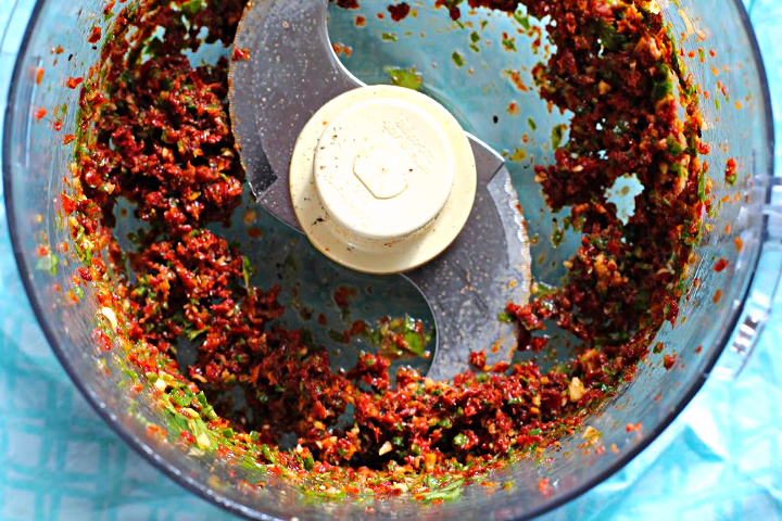 Sun-dried tomato basil spread for stuffed brie appetizer