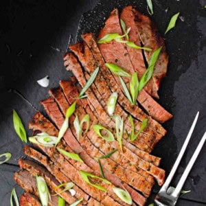 A grilled sliced flank steak that's been marinated overnight.