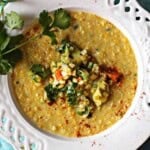 Sweet corn soup topped with corn guacamole