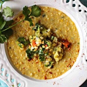 Sweet corn soup topped with corn guacamole