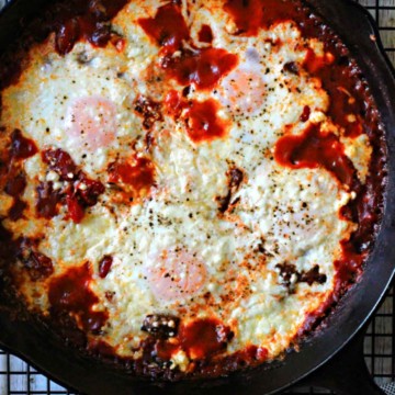 Mexican eggs baked in a cast iron skillet