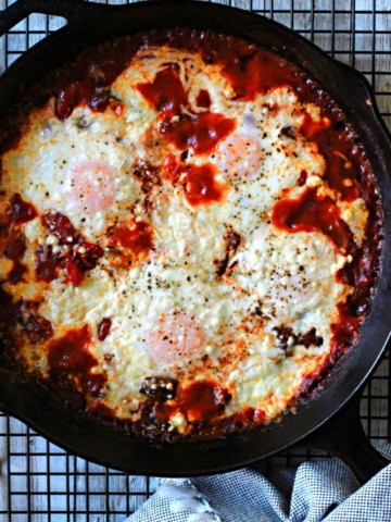 Mexican eggs baked in a cast iron skillet