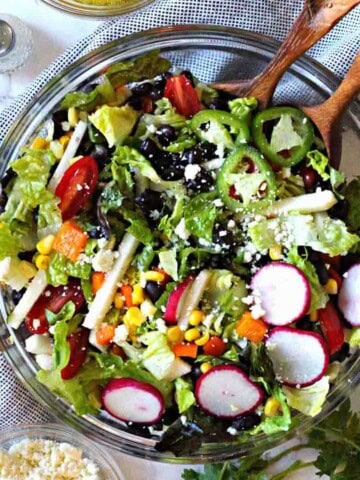 Southwestern salad in a clear salad bowl.