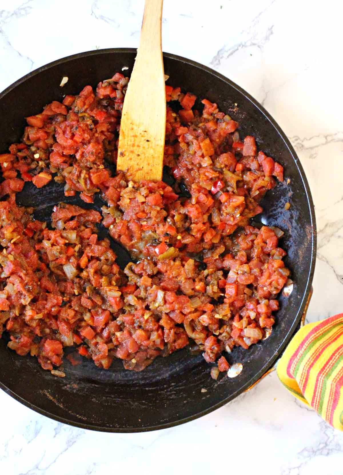 Making sofrito for spicy meatloaf in a fry pan
