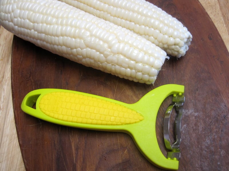 Corn kernel removal tool with Colorado White Sweet Corn to make sweet corn soup.
