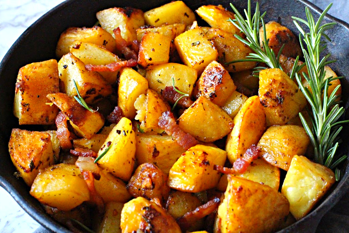 Oven roasted browned yukon gold potatoes cooked in a cast iron skillet