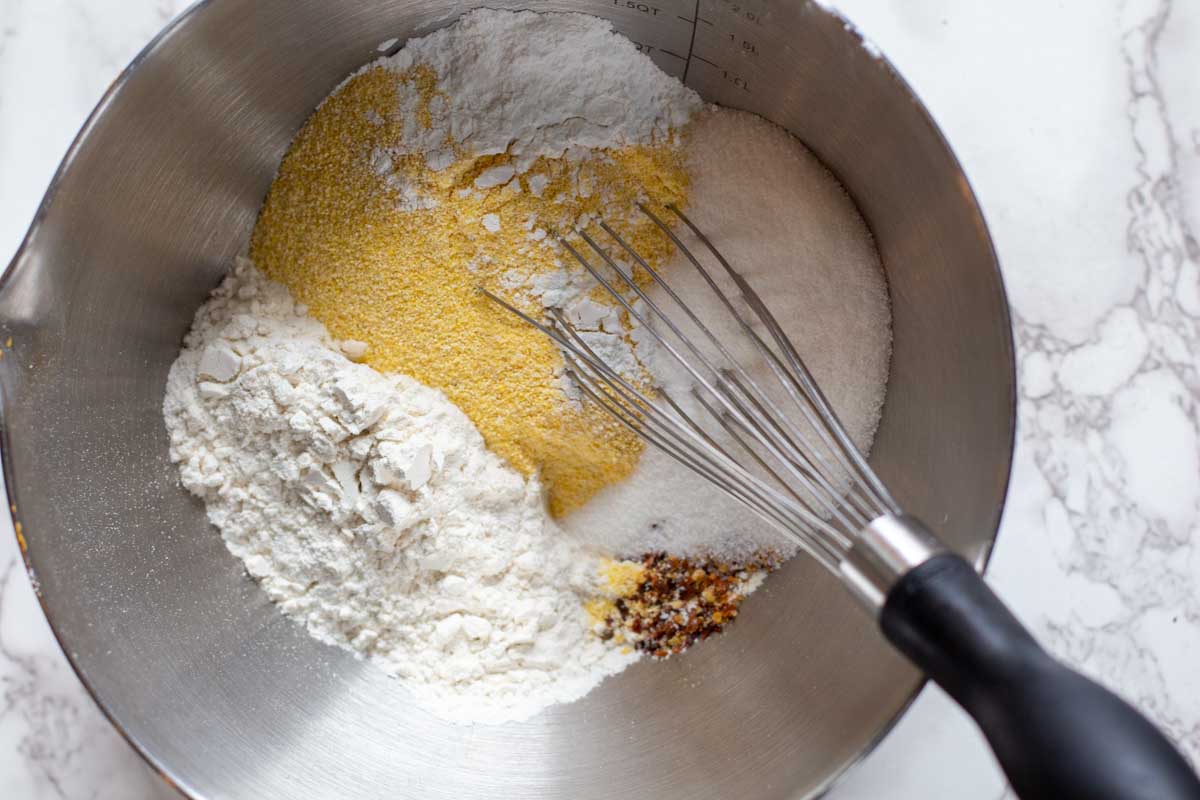 Dry ingredients used to make jalapeno jelly corn muffins