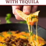 Queso with tequila on a corn chip