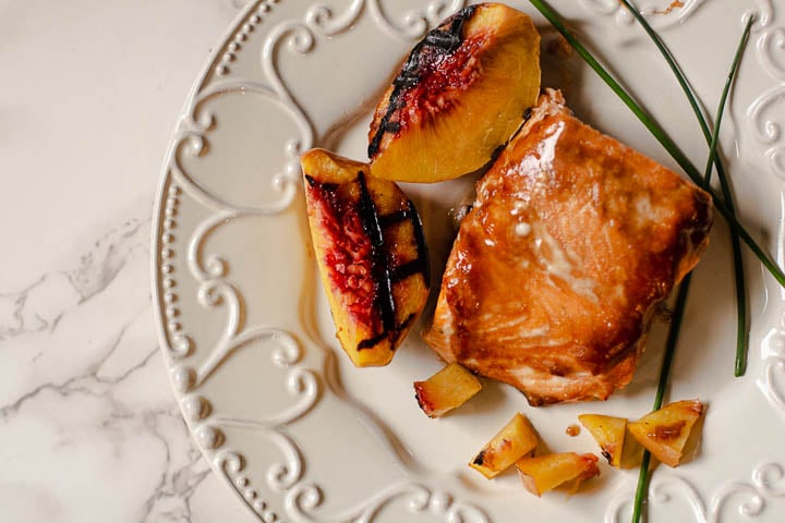Grilled salmon with homemade teriyaki sauce and grilled peaches