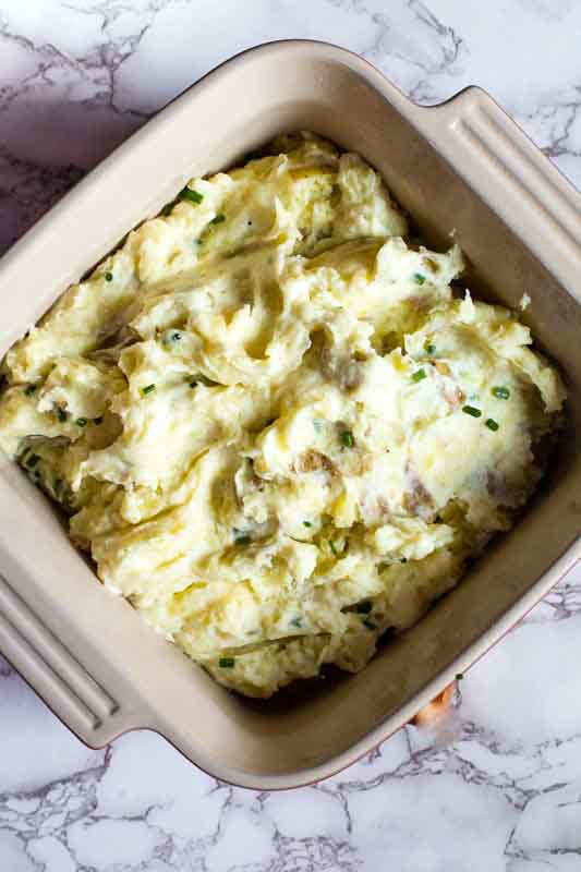 Mashed potatoes in a casserole dish.