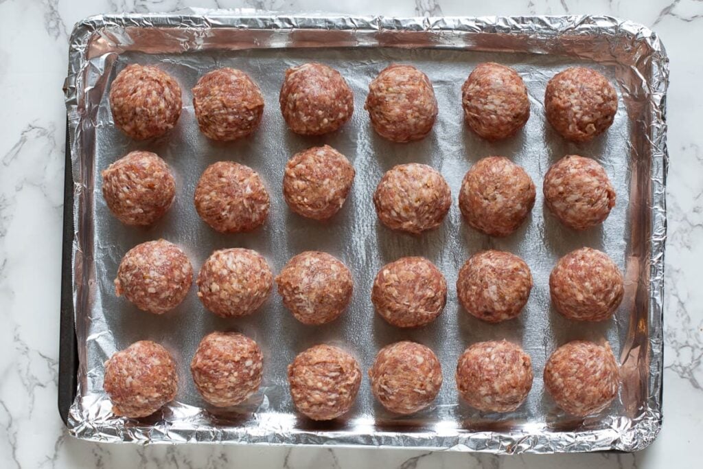 Italian meatballs ready to bake for Sriracha Meatballs appetizer