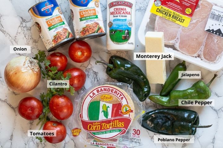 Ingredients for baked chicken enchiladas with tomato cream sauce.