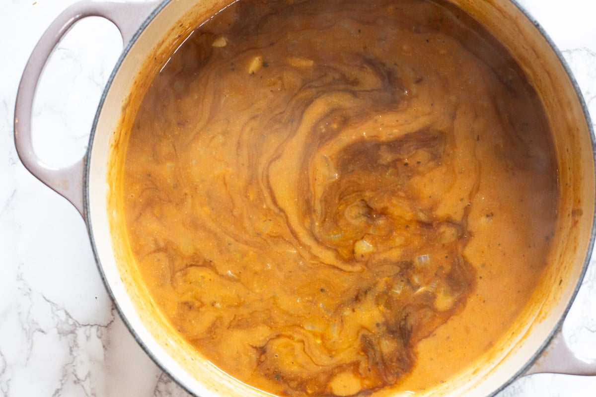 Adding molasses to red chile gravy for carne adovada