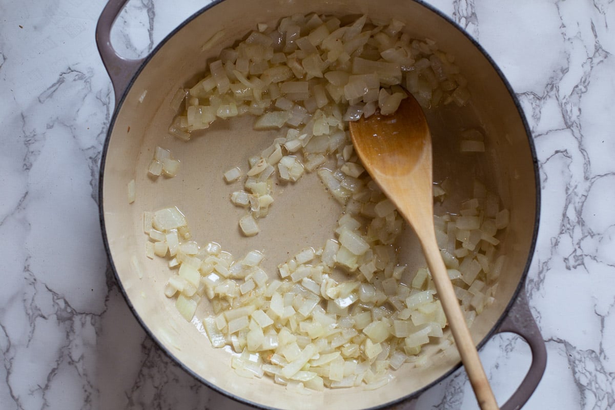sauteeing onions in butter to make soup