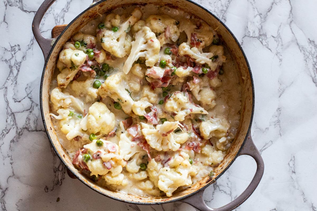 Creamed cauliflower in a Le Creuset Dutch Oven.