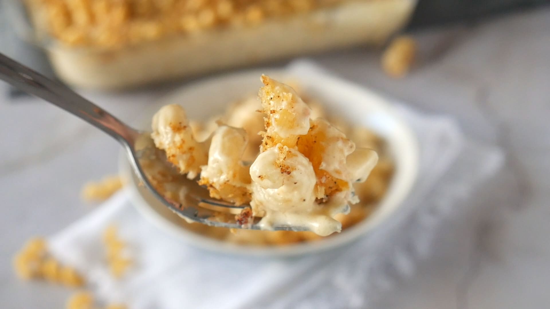 A spoon full of Flemings steakhouse mac and cheese
