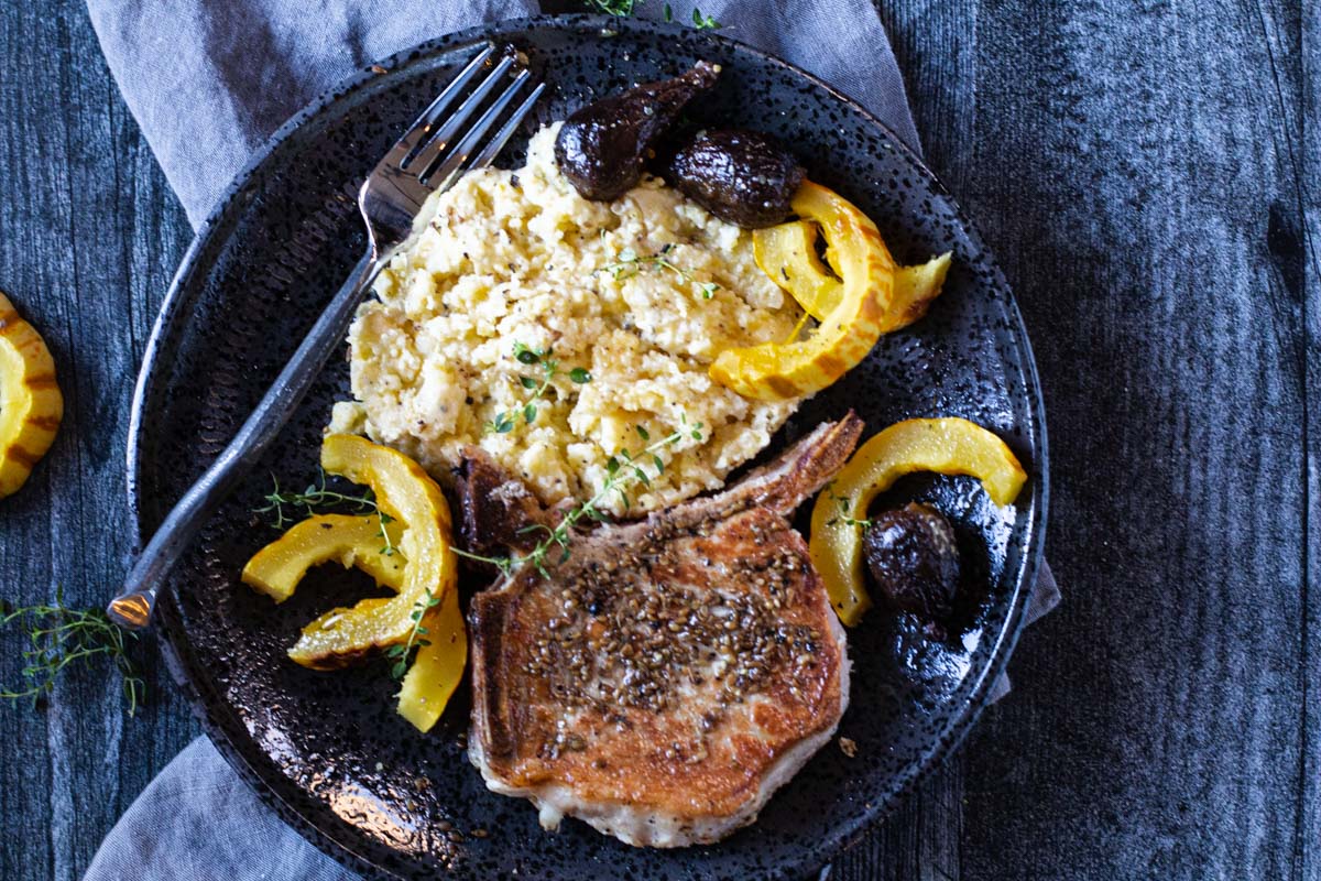 Slow Cooker Pork Chops with Apples served with Delicata Squash and Polenta