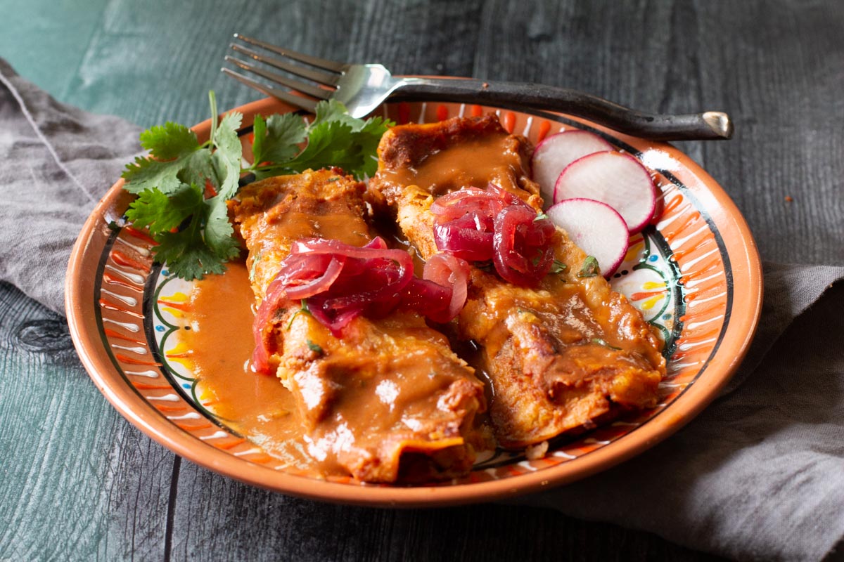 Cochinita Pibel Pulled Pork Enchiladas On A Mexican Plate