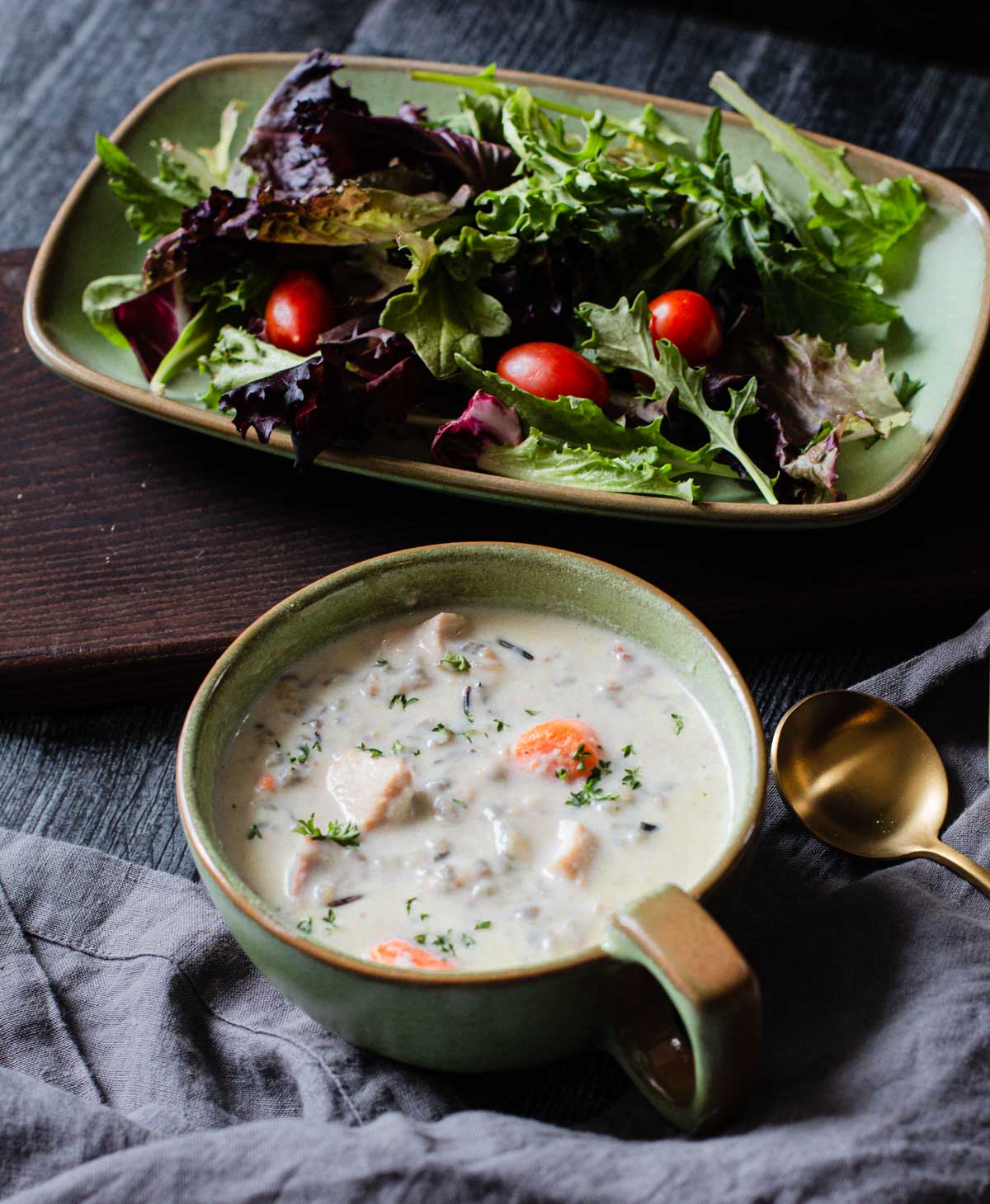 Creamy chicken and wild rice soup served with a side salad