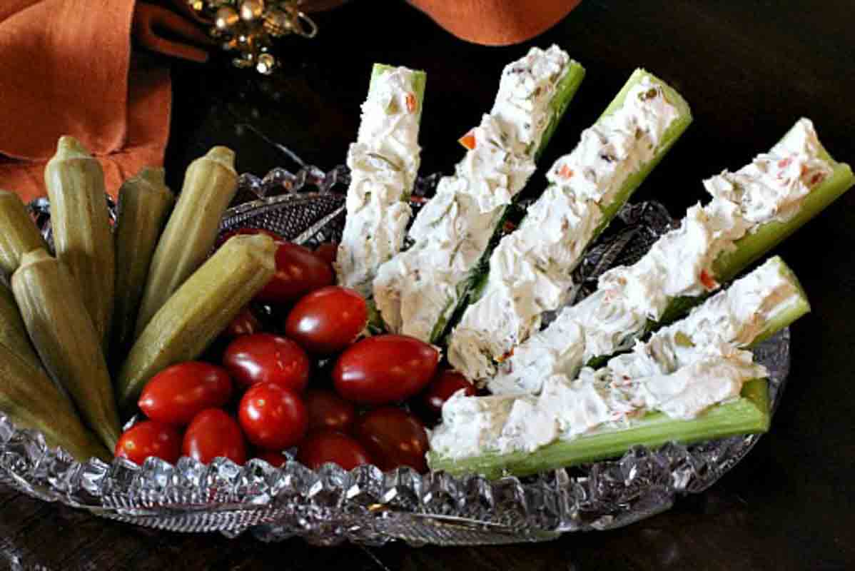 Stuffed celery sticks on an appetizer platter.