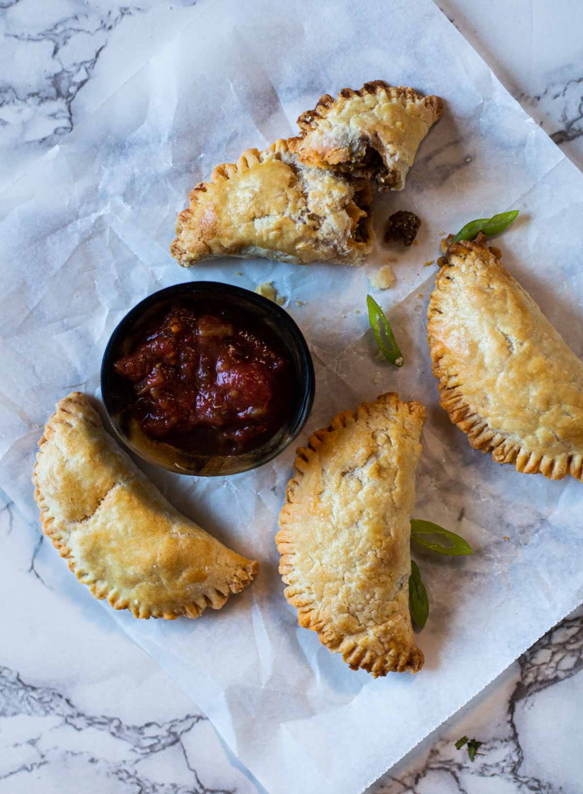 Chorizo empanadas served with salsa