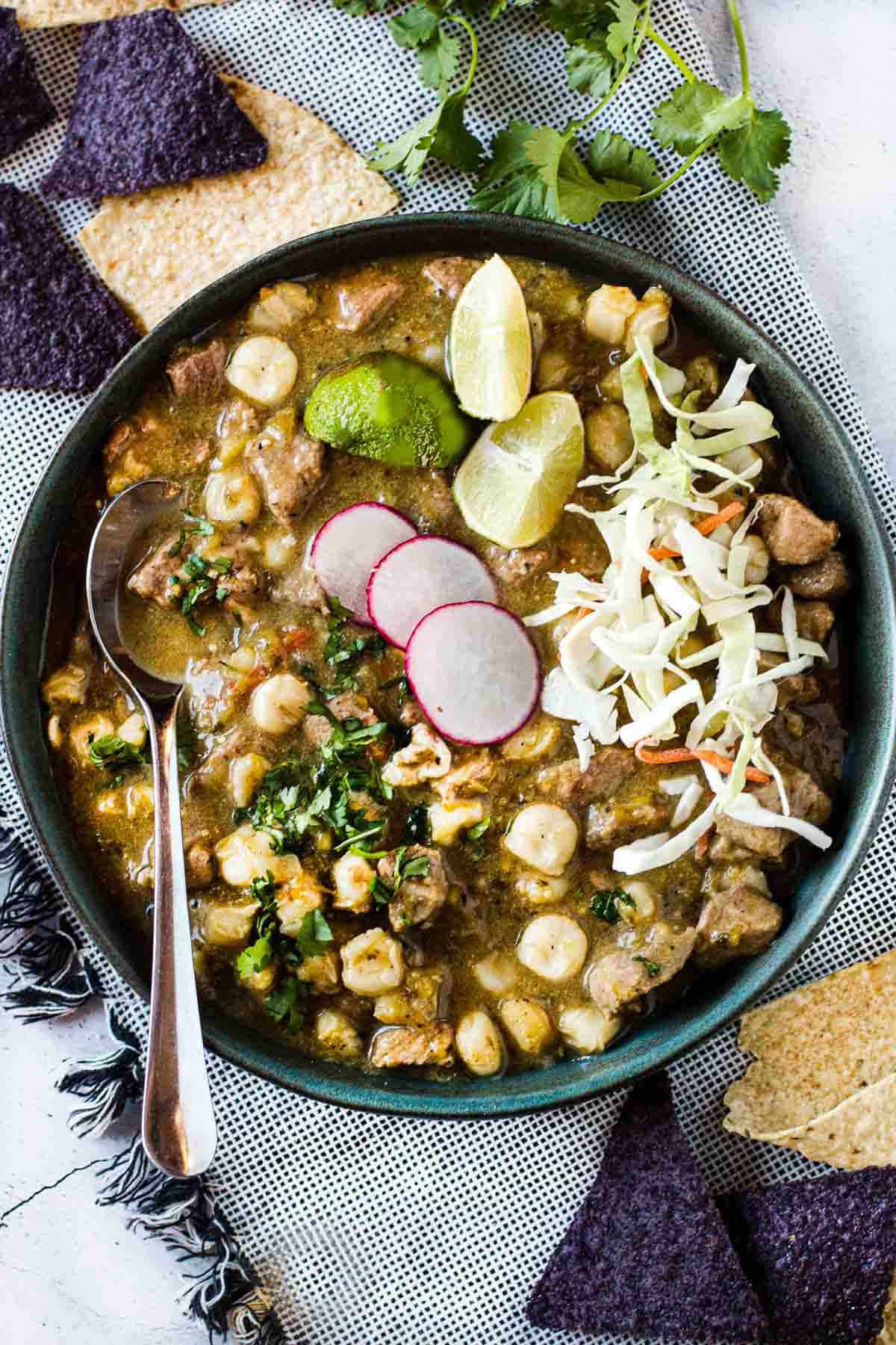 New Mexico Pork Pozole served with blue corn chips.