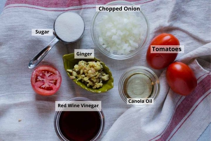 Ingredients to make sweet tomato chutney